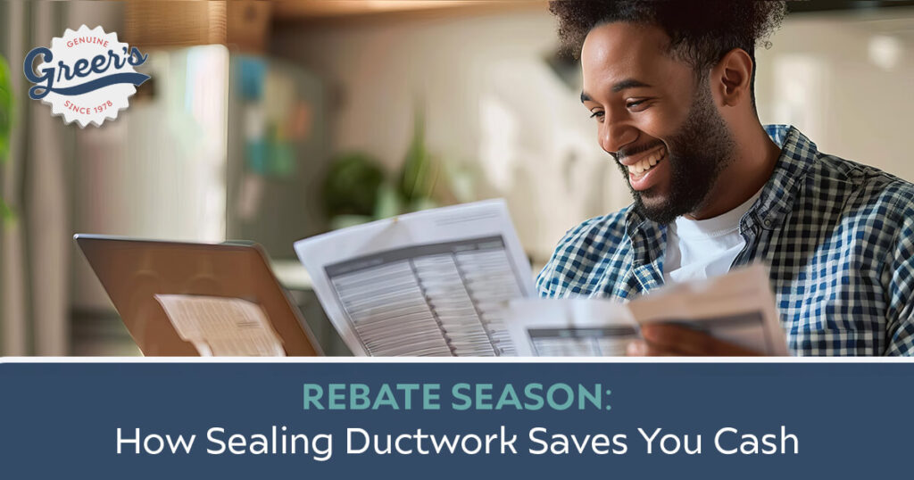 Sealing Ductwork - Man looking at bills smiling - Greer's Heating & Air